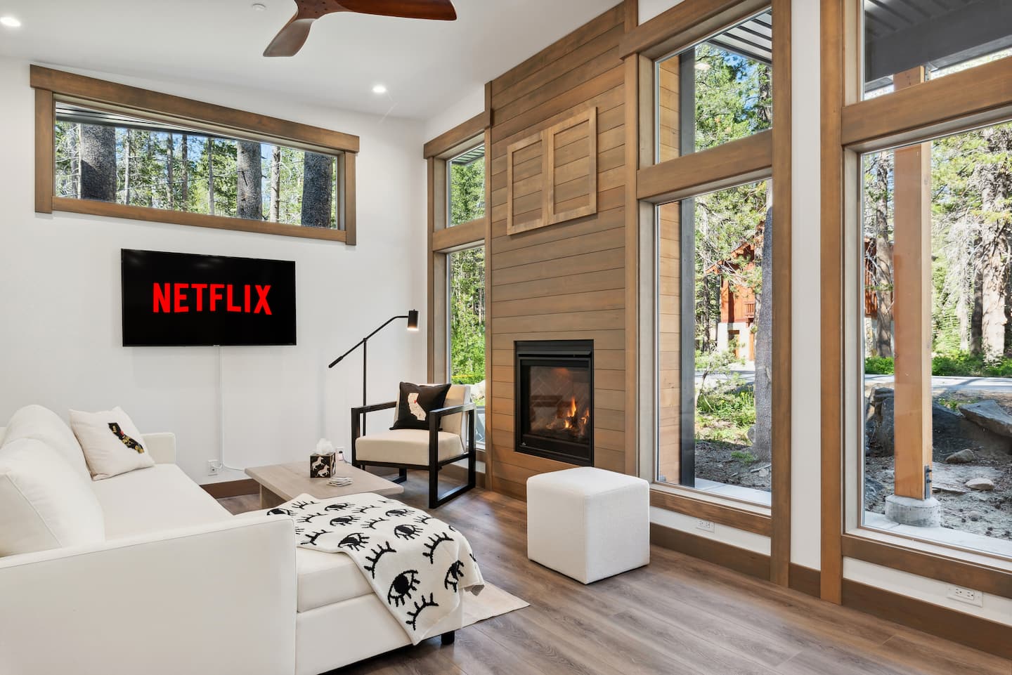 LuxCabin living room looking into the Sierra forest
